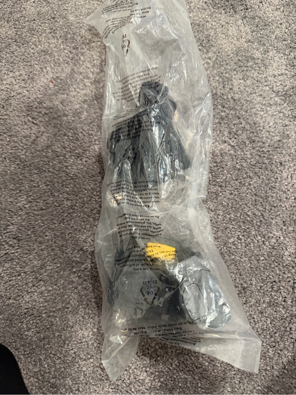Black Rubber Door Stopper with Yellow Tag